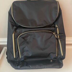 Samonsite Stylish Black Backpack with Gold Accents
